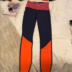 Hot pink and navy blue lululemon leggings
